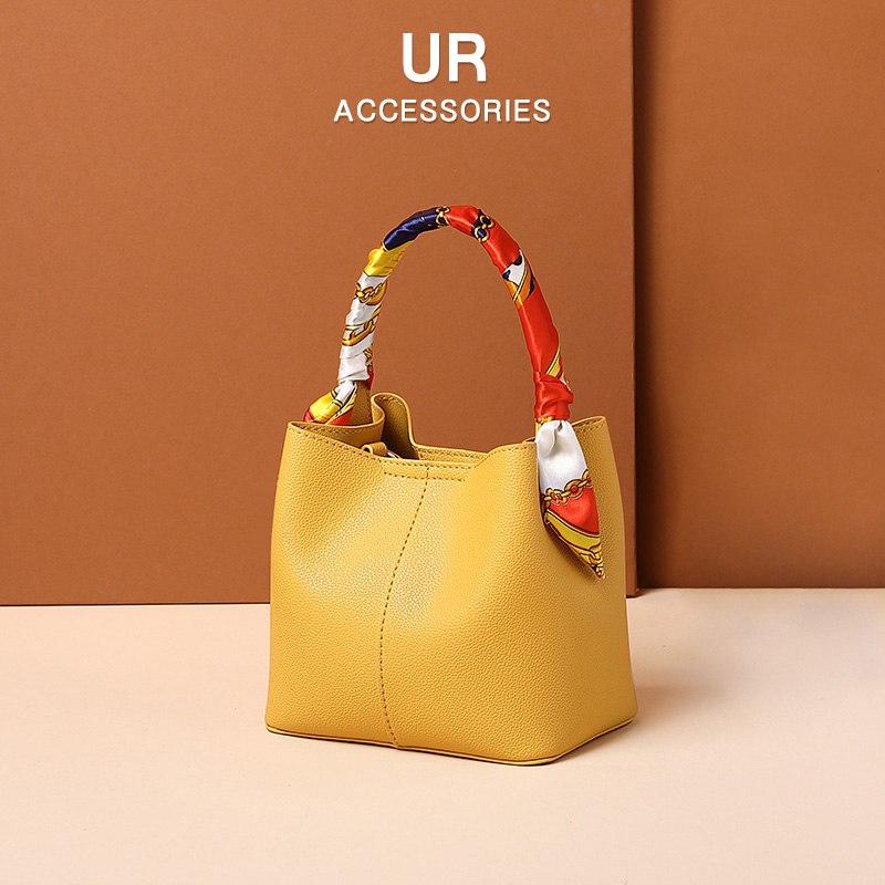 98元【UR箱包旗舰店】UR时髦马卡龙手提水桶包￥KAj92SJuwMD￥/